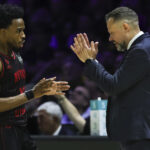 Jerrick Harding y Giedrius Žibėnas técnico del Rytas Vilnius